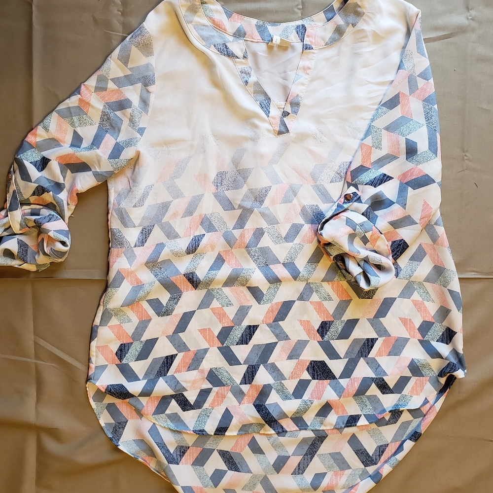 White tunic, size medium.